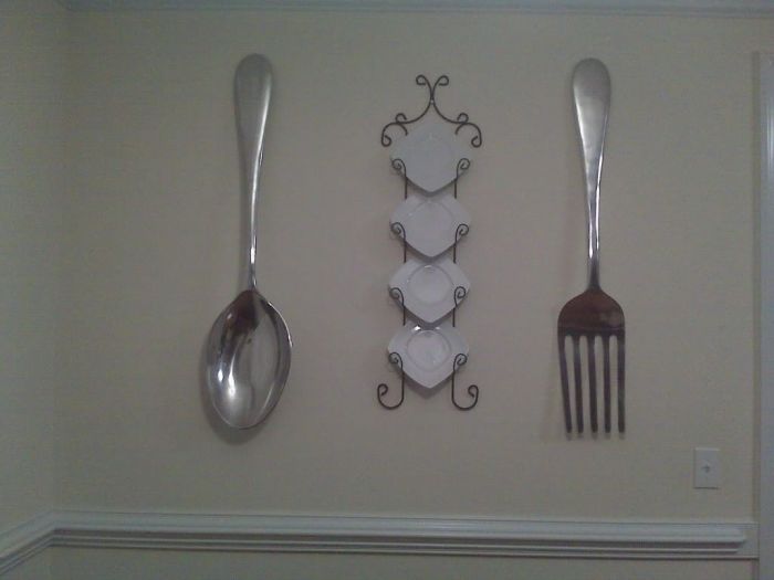 Giant wooden fork and spoon wall decor